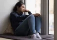 A woman struggles with hyperstimulation anxiety.