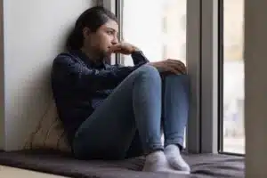 A woman struggles with hyperstimulation anxiety.