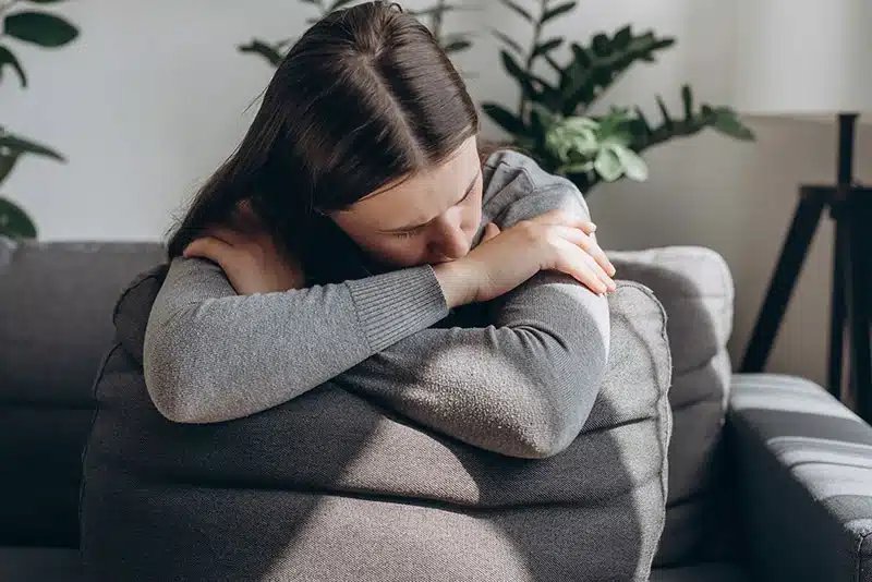 A person deals with triggers in addiction.