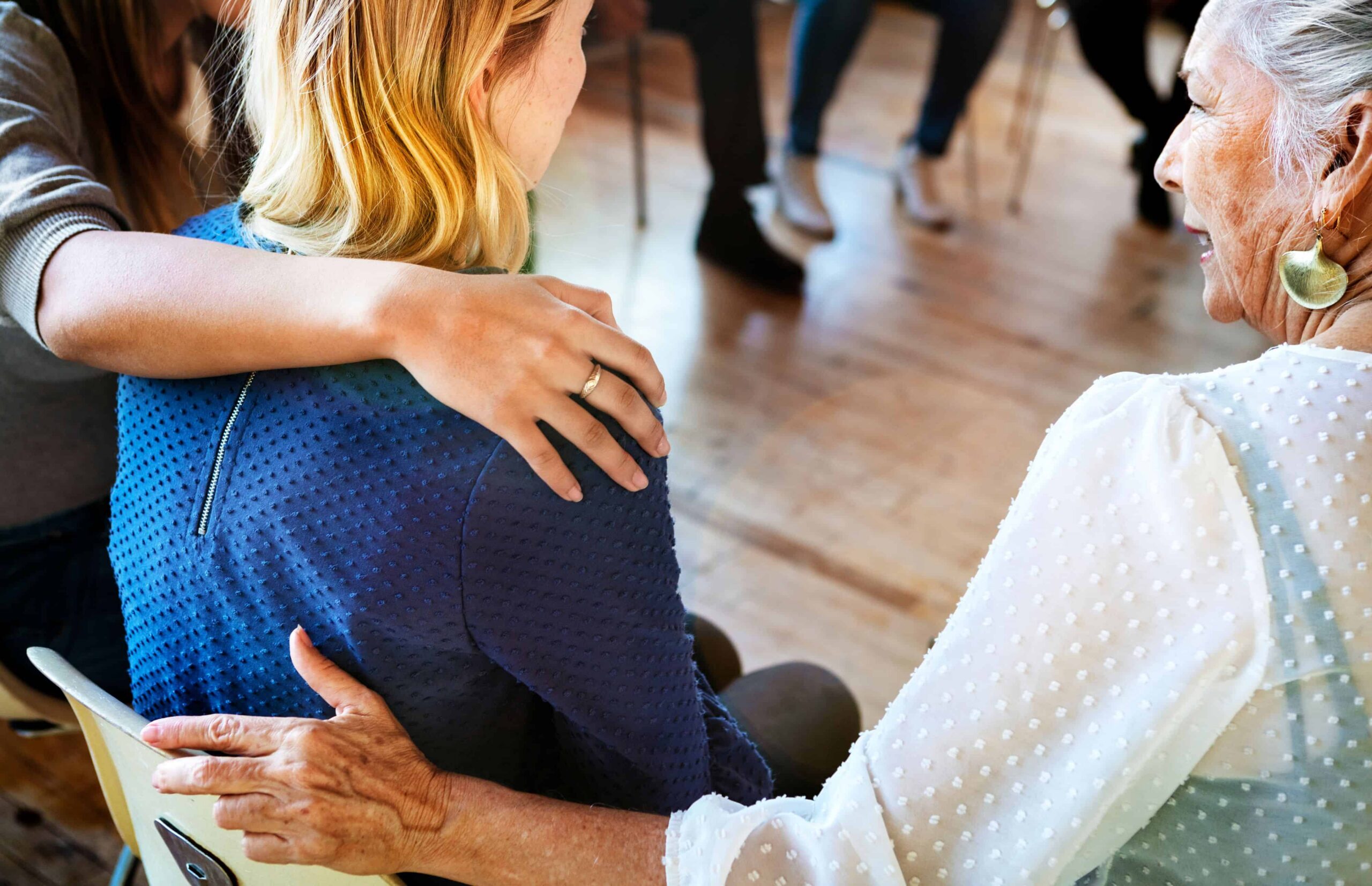 Women showing support for each other at women's benzo addiction treatment.