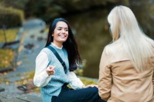 mom and daughter talking how to get someone into rehab
