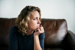 woman sitting and thinking signs of benzo addiction